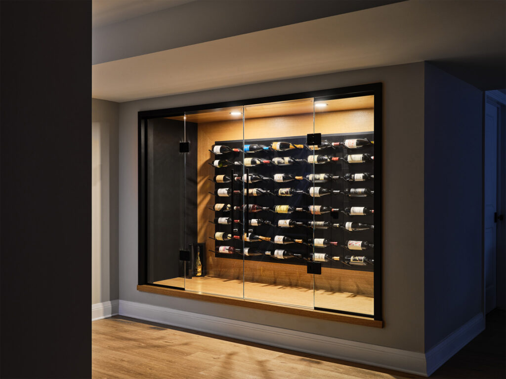 A collection of wine bottles neatly arranged on wall-mounted racks