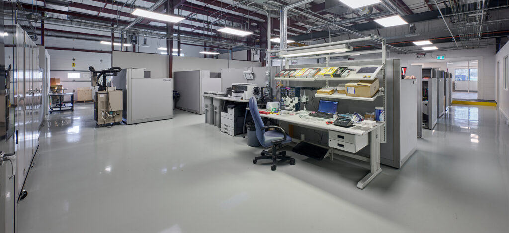 An industrial workspace with organized equipment and workstations