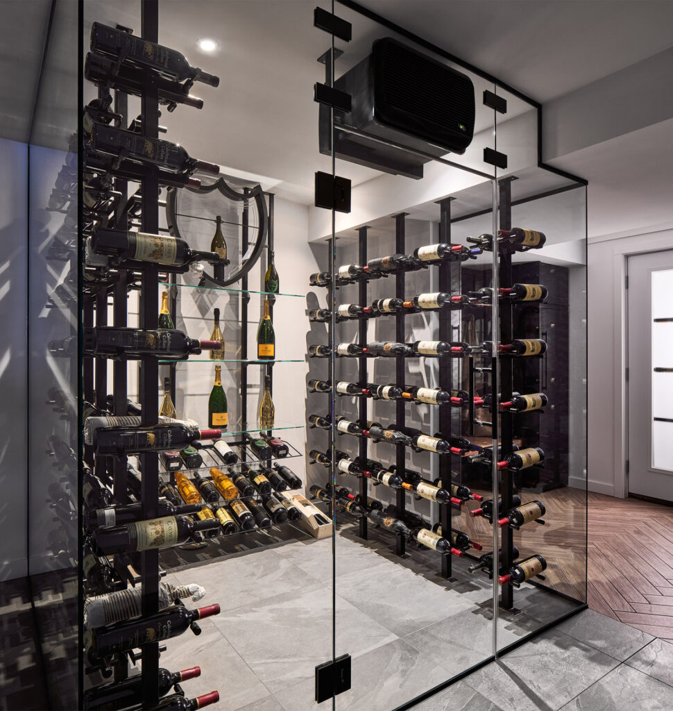 Contemporary wine cellar with wall-mounted racks and glass enclosure in the Broadway Renovation home